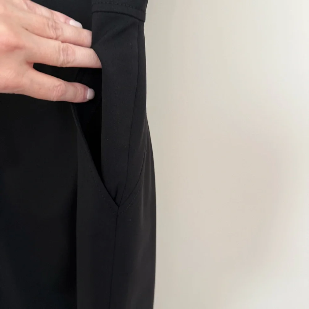 J. Crew Elegant Black Resume Dress. Pockets, back vent and zipper. Sleeveless.